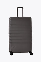 The Large Check-In Roller in Charcoal